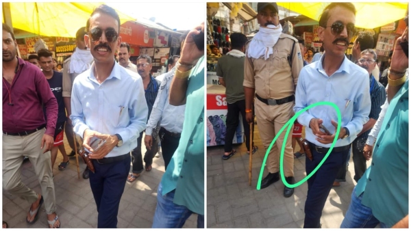 Encroachment officer Shailendra Bhadauria reached New Market with revolver traders protested