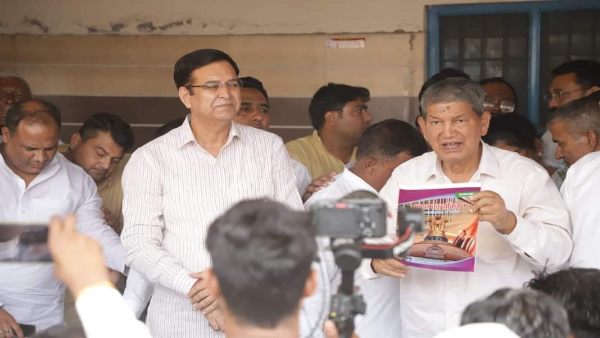 Harish Rawat Congressmen staged protest at police post manglore serious allegations by-elections