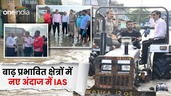 IAS Deepak RAWAT seen in a new style in flood affected areas KHATIMA inspected tractor with DIG