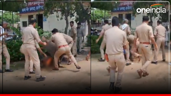 video-in-aligarh-a-son-poured-petrol-on-his-mother-and-set-her-on-fire-in-a-police-station video-in-aligarh-a-son-poured-petrol-on-his-mother-and-set-her-on-fire-in-a-police-station