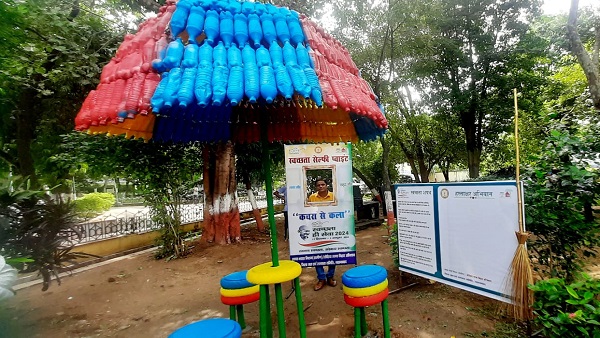 Jehanabad News Umbrella made from waste bottles and center table from bad tyres art from waste