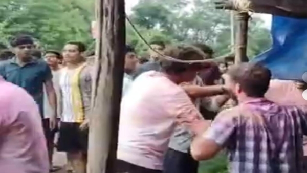 Girl students molested two groups of university students fight during Ganesh immersion procession