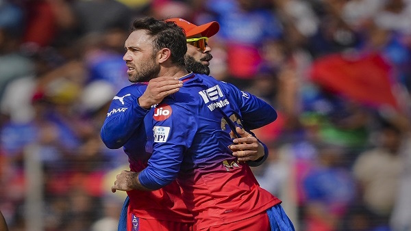 Glenn Maxwell with Virat Kohli