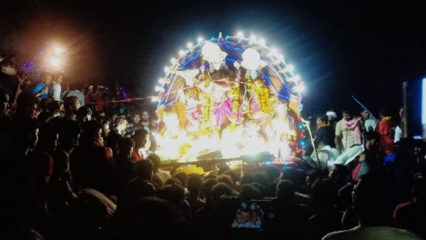 Immersion Goddess on shoulders floating ceremony of shouldered Kali in the ocean on Dussehra