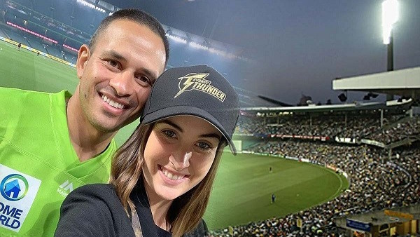usman khawaja with his wife
