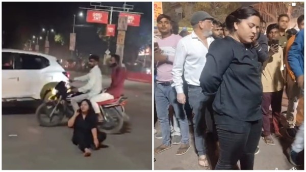 Woman lying on the road under the influence of alcohol moved away after efforts by police Woman lying on the road under the influence of alcohol moved away after efforts by police