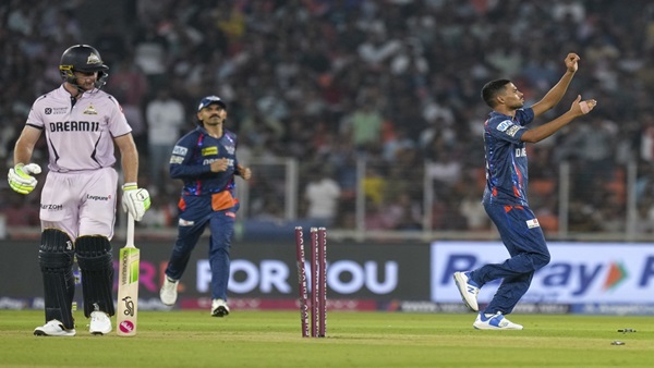 Akash Singh celebrates the wicket