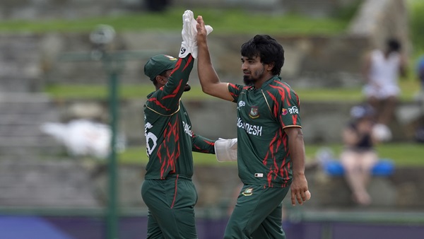 Tanzim Hasan with teammate Litton Das