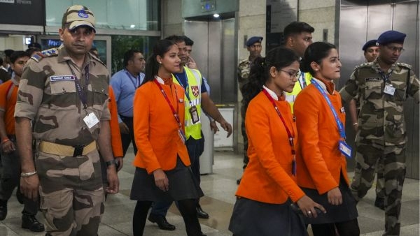 Security personnel and others during