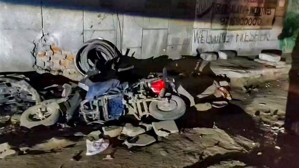 Damaged vehicle at Ramgarh road accident scene