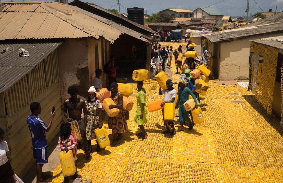 yellow tapestry, Serge Attukwei, Accra, Ghana yellow tapestry, Serge Attukwei, Accra, Ghana