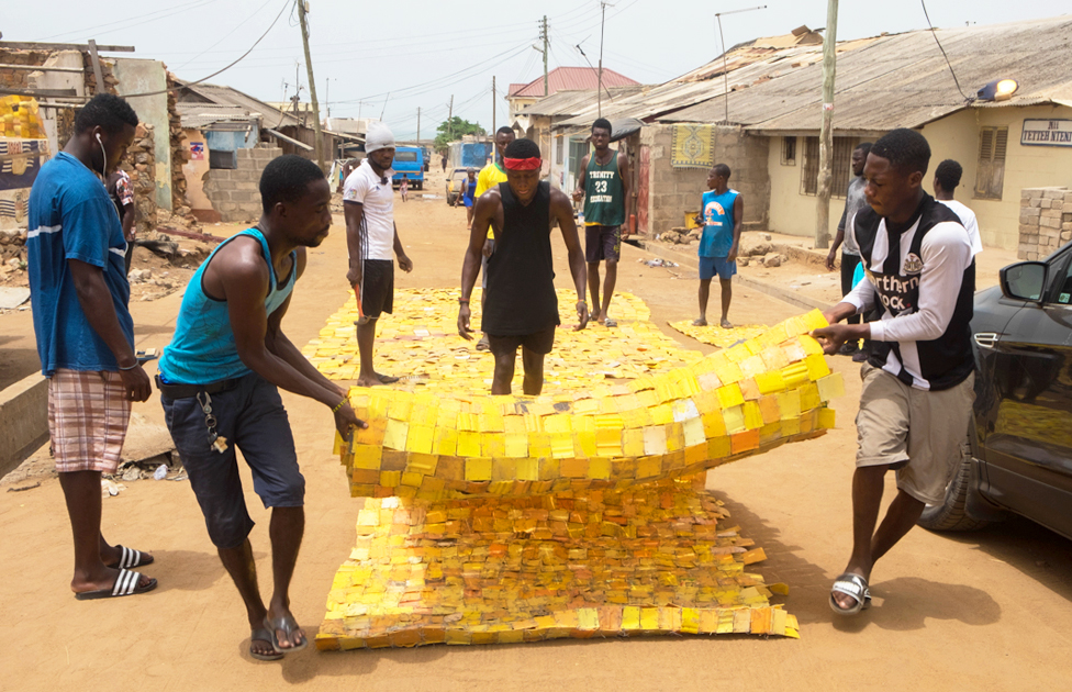 yellow tapestry, Serge Attukwei, Accra, Ghana yellow tapestry, Serge Attukwei, Accra, Ghana
