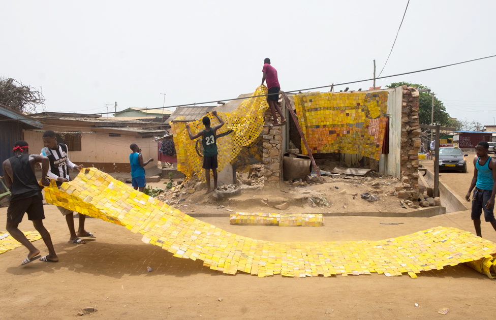 yellow tapestry, Serge Attukwei, Accra, Ghana yellow tapestry, Serge Attukwei, Accra, Ghana