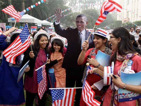 Barack Obama supporters celebrate victory in New Delhi