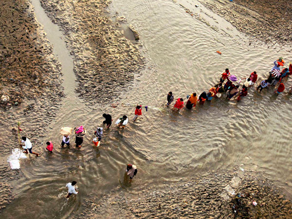Devotees after performing Chhath Puja