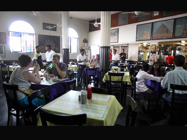 Life is back: View of famous Leopold Cafe in Mumbai