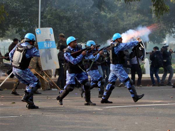 RAF personnel fire tear gas shells RAF personnel fire tear gas shells