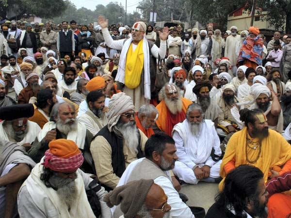 Sadhus or holy men staging a dharna Sadhus or holy men staging a dharna