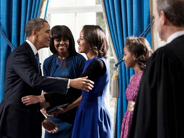 Barack Obama embraces daughter Malia Barack Obama embraces daughter Malia