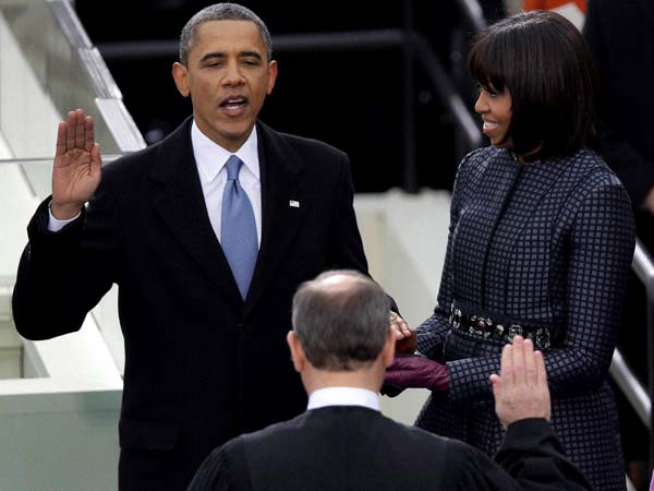 Barack Obama receives the oath of office