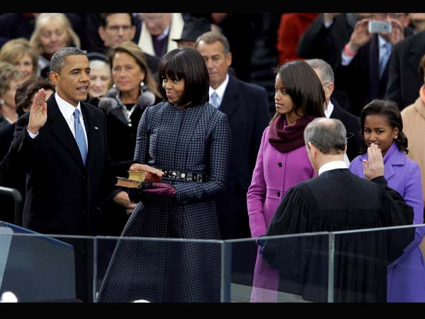 Barack Obama receives the oath of office from Chief Justice John Roberts