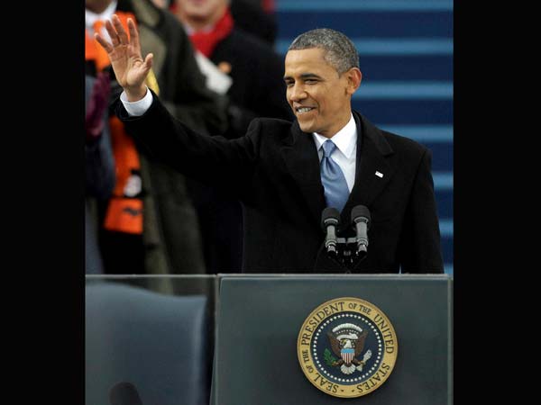 Barack Obama waves after his ceremonial swearing-in
