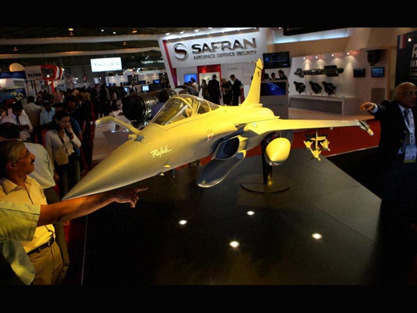 Visitors having a look of a model of Rafale aircraft 