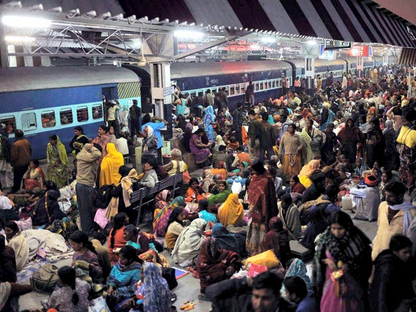 Devotees waiting for trains at Allahabad railway station