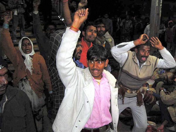 People shout for help after a stampede
