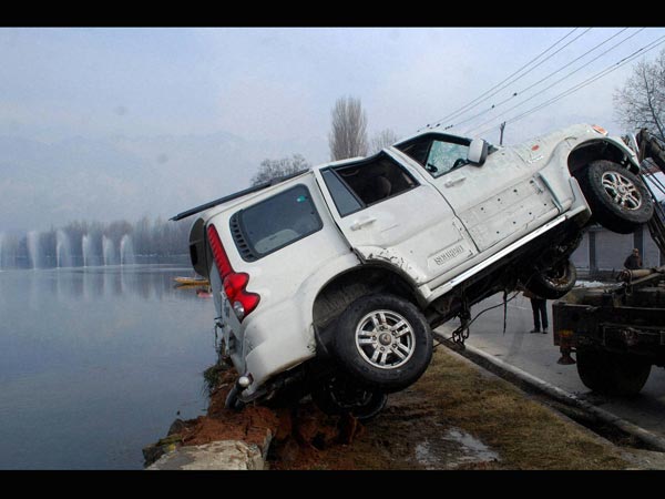 Policemen recover a vehicle Policemen recover a vehicle