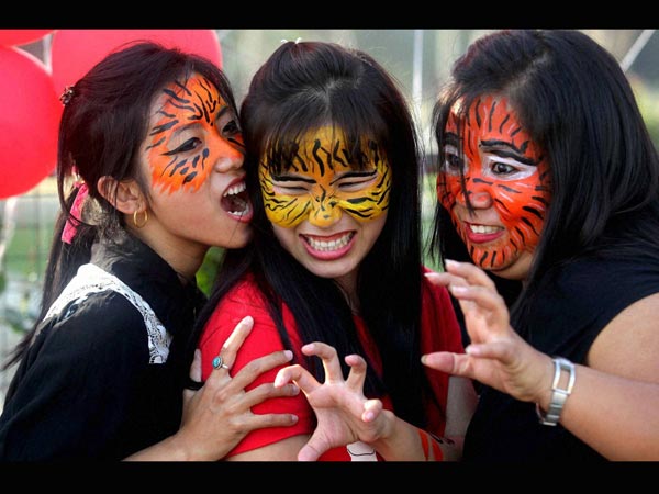 Girls take part in a global protests 'One Billion Rising' campaign