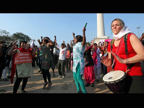 People take part in a global protests 'One Billion Rising' campaign