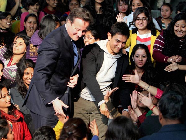 David Cameron and actor Aamir Khan with students