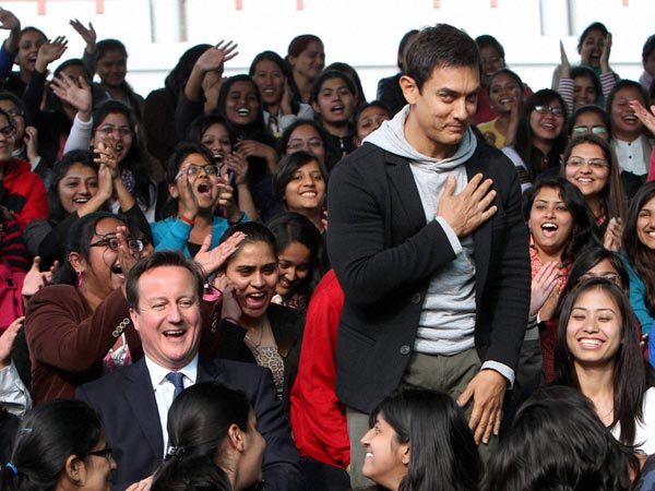 David Cameron and actor Aamir Khan with students