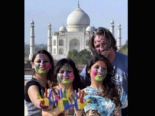 Foreigners enjoying Holi Foreigners enjoying Holi
