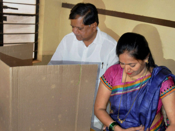 The CM votes along with his wife The CM votes along with his wife