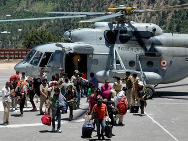 IAF Personnel Rescuing Stranded Passengers