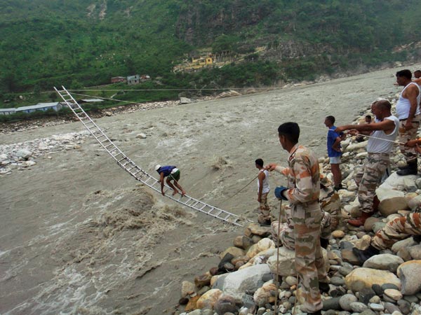 ITBP personnel rescuing flood victims