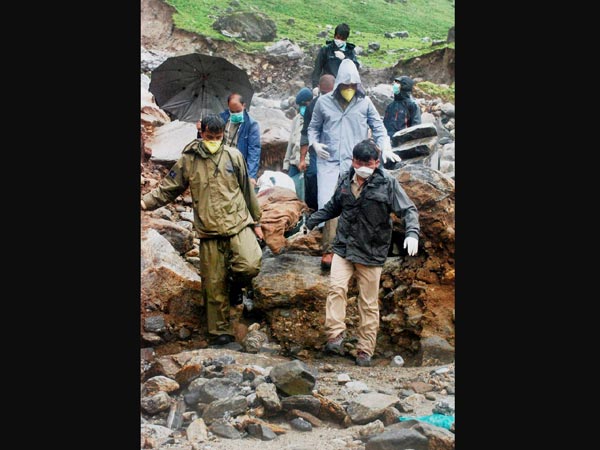 Collecting body of ill-fated pilgrims