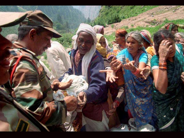 Army personnel provide food