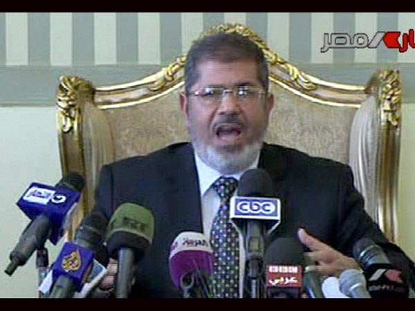 President Mohamed Morsi makes a statement