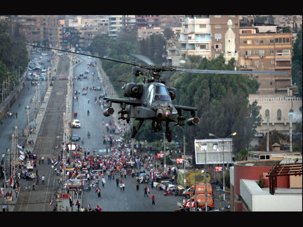Army chopper surveys the situation