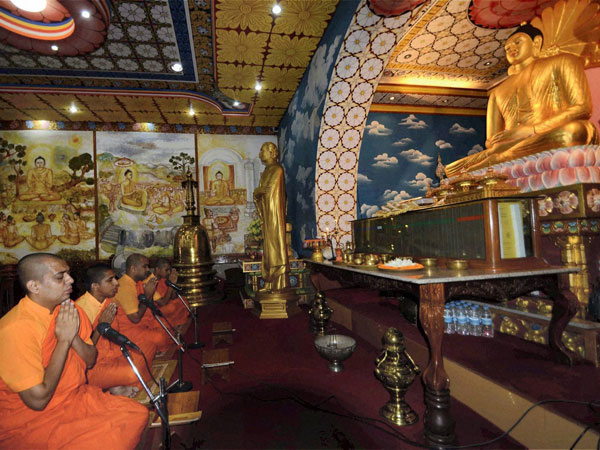 Buddhist monks offer prayers