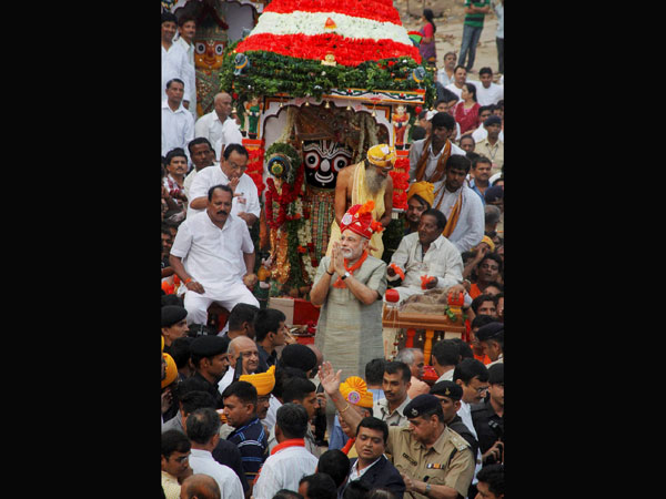 Narendra Modi greets people