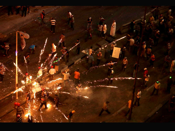 Supporters and opponents of Egypt's ousted President