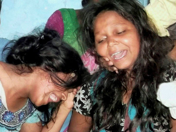 Family members of mid-day meal victims 