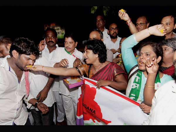 Telengana supporters celebrate in New Delhi