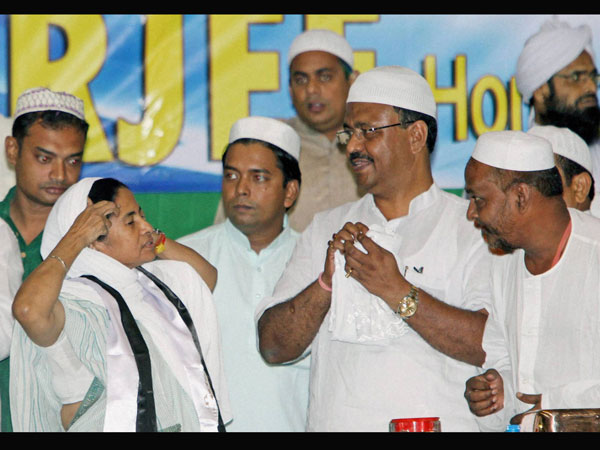 Mamata Banerjee with Muslims during an iftar party