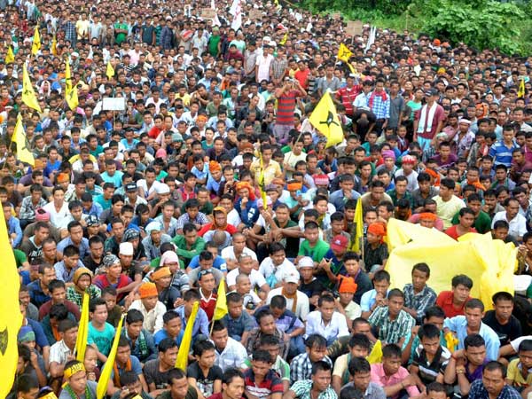 Bodo tribal youth shout slogans Bodo tribal youth shout slogans