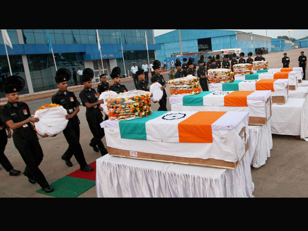 Soldiers paying tributes to five army jawans Soldiers paying tributes to five army jawans